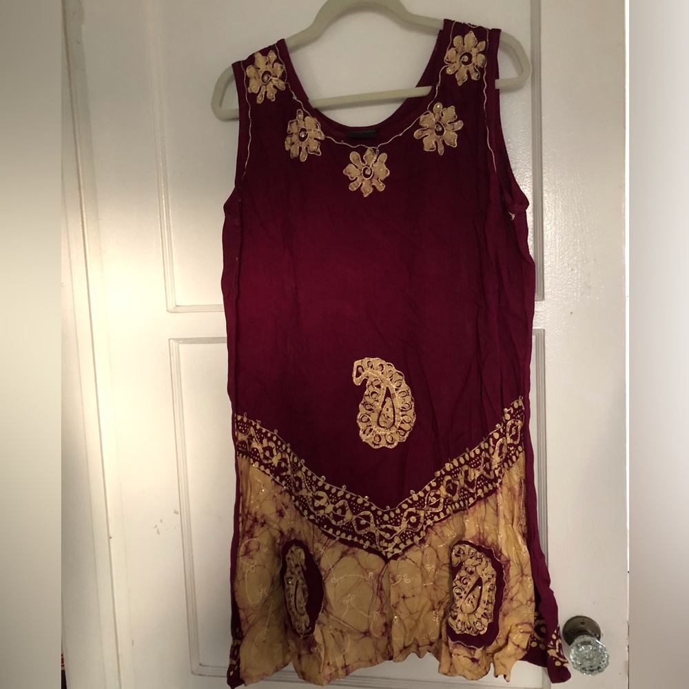 Very cute summery dress below the knees.